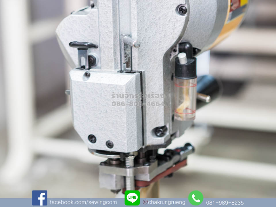 ตัวยกตีนผี และแป้นกดลับใบมีด